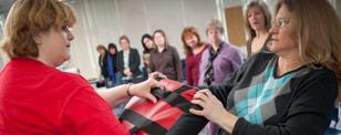 Deputy Chief of Police Bay teaches a self-defense class at Binghamton University self-defense class