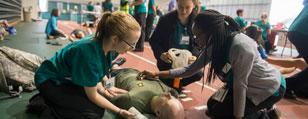 Students volunteer during annual disaster drill Students volunteer during annual disaster drill