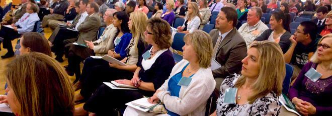 Faculty and staff gather for a meeting