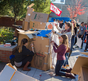 Lindsey Boody, Anna Shapiro and Katja Anuth of Phi Delta Epsilon, build a haunted house themed cardboard home during at the 2nd annual Shack-A-Thon, which raised funds and awareness for Habitat for Humanity, Monday, Oct 19, 2015.