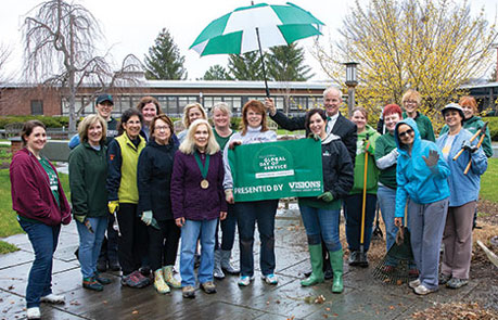 Binghamton staff, alumni and friends at a cleanup project in the Memorial Courtyard as part of Alumni Global Day of Service 2018