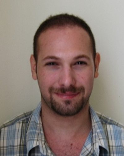 headshot of Adam Weisblatt