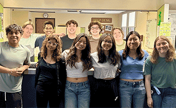 Help Desk Team in front of the Help Desk Help Desk Team