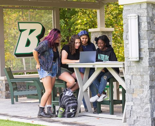 Students using outdoor Wi-Fi