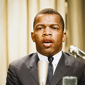 A colorized photo of John Lewis, taken in 1963