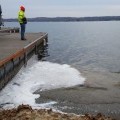 Richard W. Smith, founder of Sodus-based Global Aquatic Research and an affiliated faculty member with Binghamton University's Earth Sciences Department, stands at the shore of Canandaigua Lake.