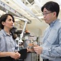 Binghamton doctoral student Maryam Rezaie, left, and Professor Seokheun “Sean” Choi have developed artificial plants that can feed off carbon dioxide, give off oxygen and generate power.