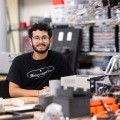 Junior mechanical engineering major and member of the Thomas J. Watson College of Engineering and Applied Science Rover team Matthew Stancampiano, photographed at the Fab Lab in the Engineering Buildi