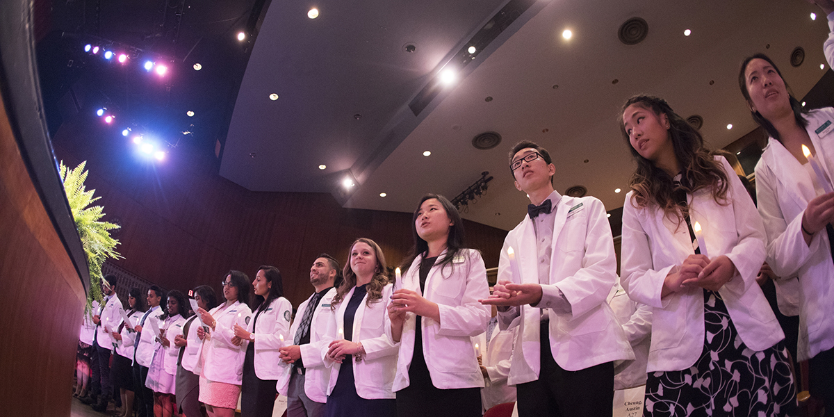 Pictured here is the School of Pharmacy and Pharmaceutical Sciences first White Coat Ceremony, held Saturday, Sept. 9, 2017. Six members of this now about-to-graduate Class of 2021 have been matched for residencies.