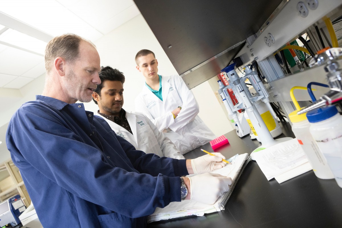 Binghamton University Psychology Professor Christopher R. Bishop discusses neuroscience research with participants in the Bridges to the Baccalaureate Program on July 6, 2023.