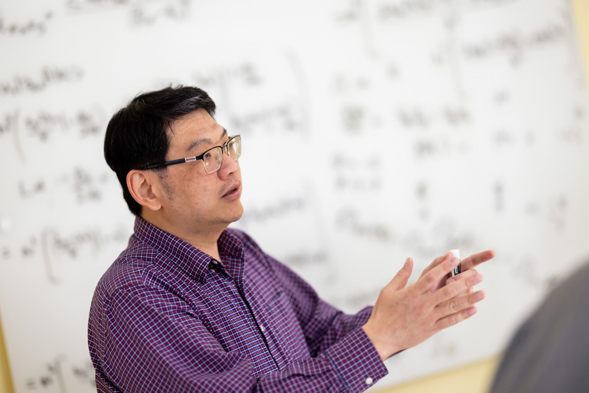 Associate Professor of Physics Wei-Cheng Lee teaches class in the Smart Energy Building.