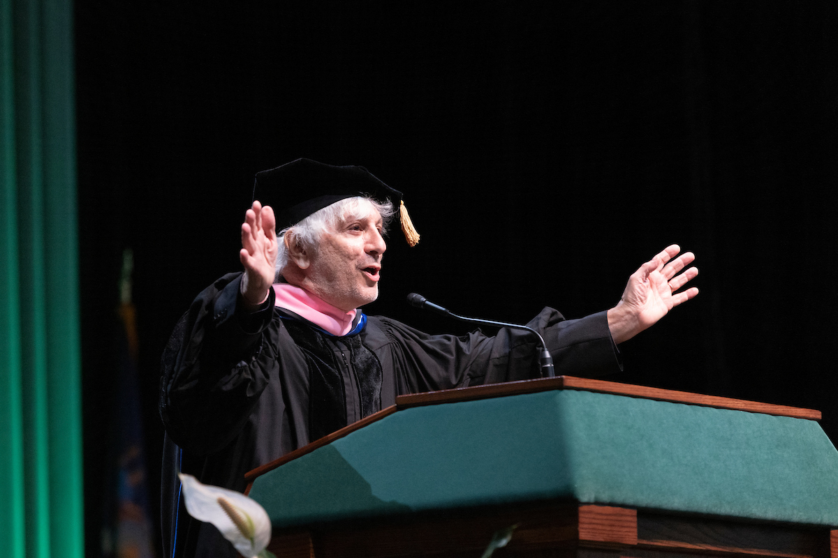Honorary degree recipient Lee Ranaldo ’78 speaks to the Class of '24 during the third Harpur ceremony.