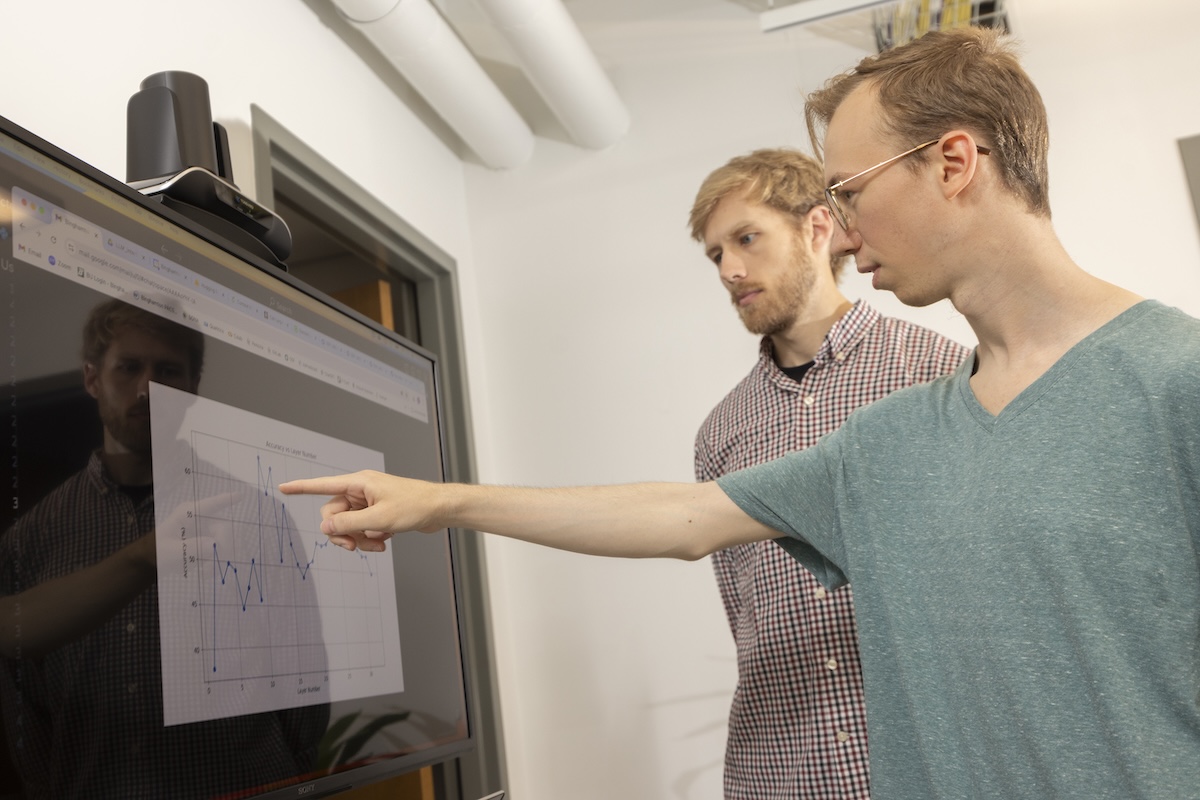 William Hayes, an assistant professor in the Department of Psychology, leads Isaac Cohen, a senior studying computer science, in the Decision Research and Modeling (DReaM) lab. Hayes' BUPNUR project includes Cohen, who is funded by the Chancellor’s Summer Research Excellence Fund.