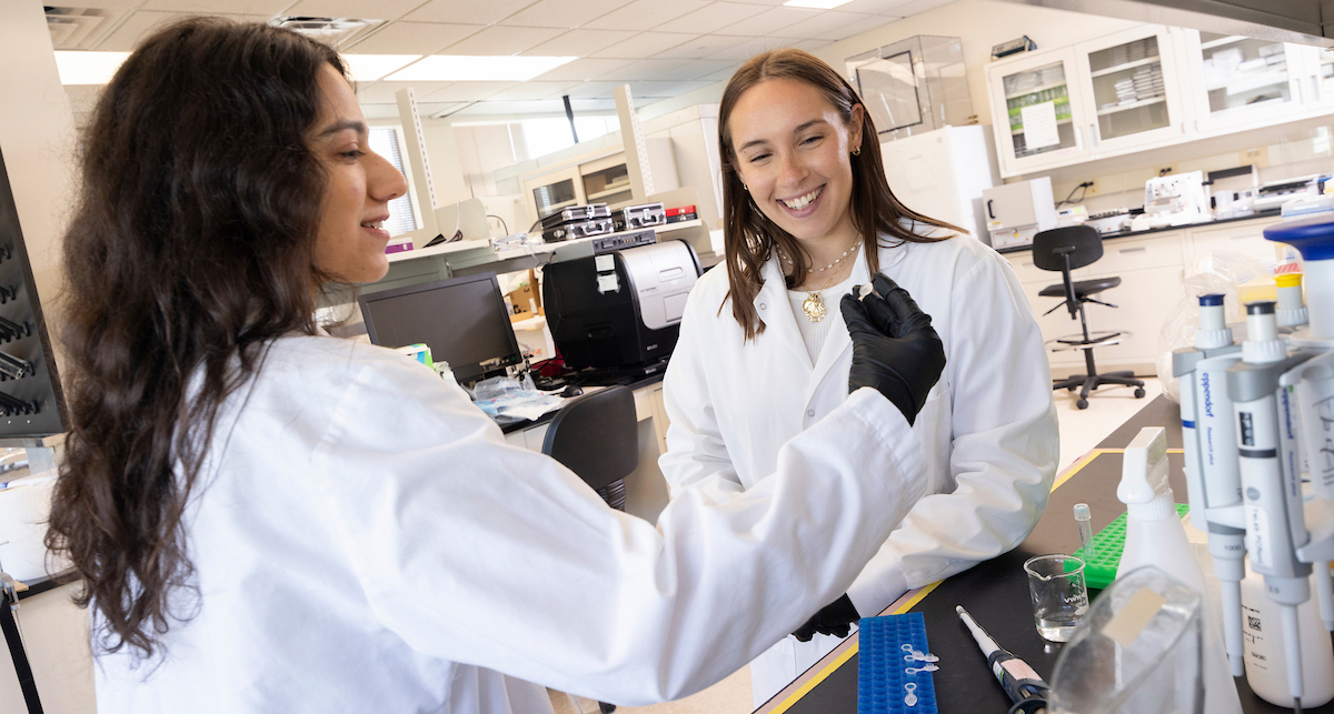 Biomedical engineering graduate students Geena Boasi, left, and Alexia Bartlow work in the Douglas Hsu Research Laboratory in the Biotechnology Building at the Innovative Technologies Complex.