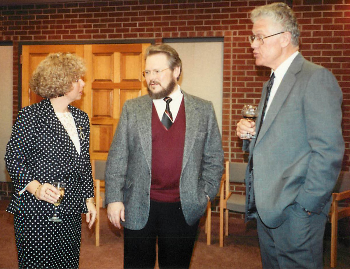 Bonnie Cornick, Michael McGoff and Dean Lyle Feisel at a Watson School holiday party in December 1989.