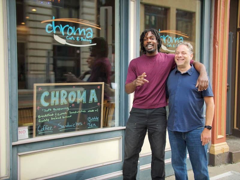 Leighton Blackwood '21 and mentor Eric Krohn, director of business incubation programming at the Koffman Southern Tier Incubator, outside of Chroma.