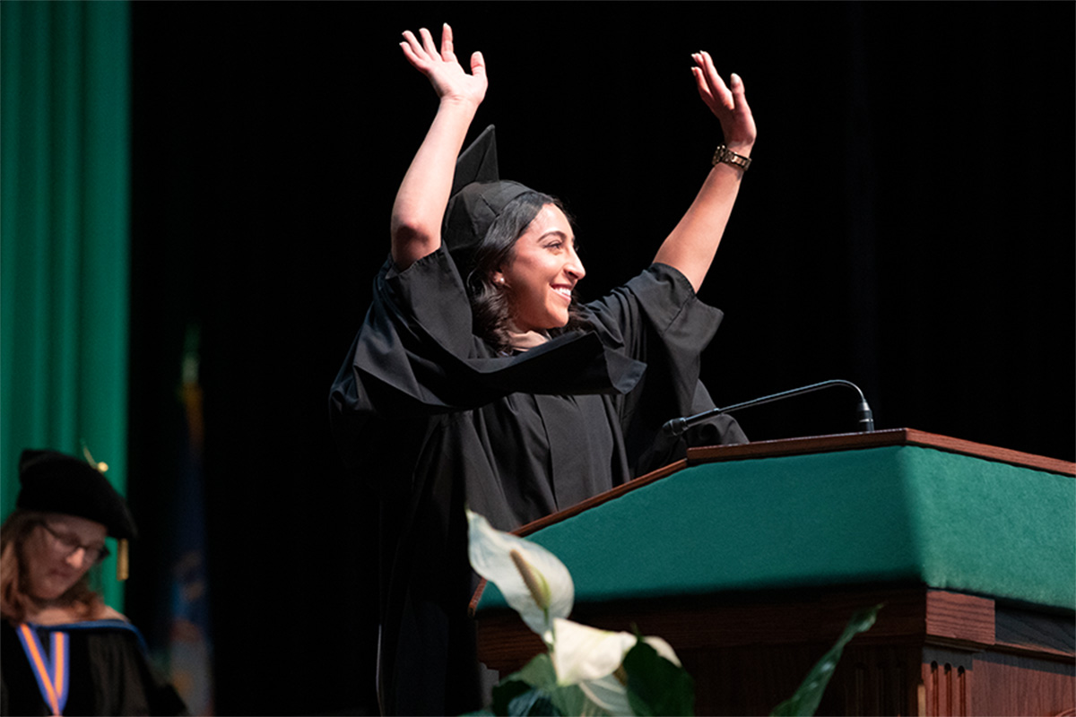 Nora Monasheri delivers the student Commencement speech for the School of Management.