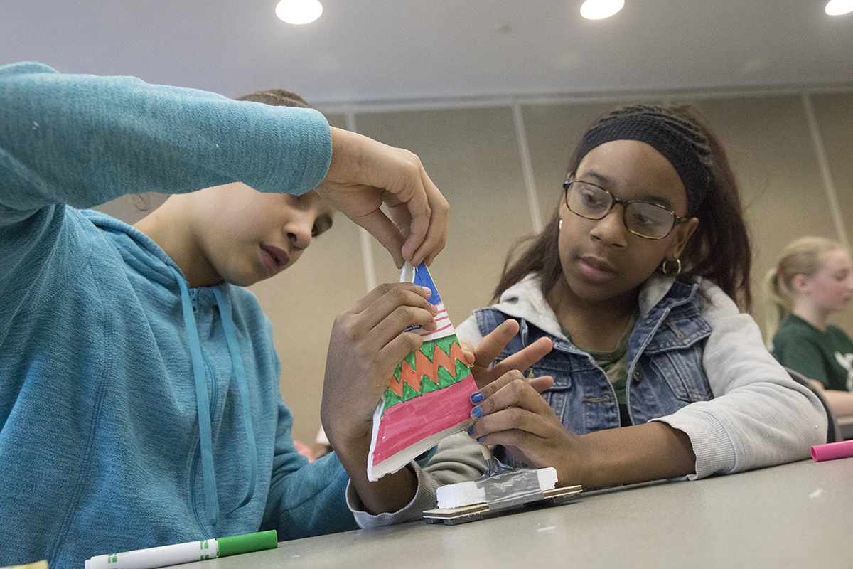 Binghamton East and West Middle-School students in the sixth grade learn basic science lessons from Watson School students during a STEM visit to the Engineering and Science Building at the Innovative Technologies Complex, Feb. 13, 2017.