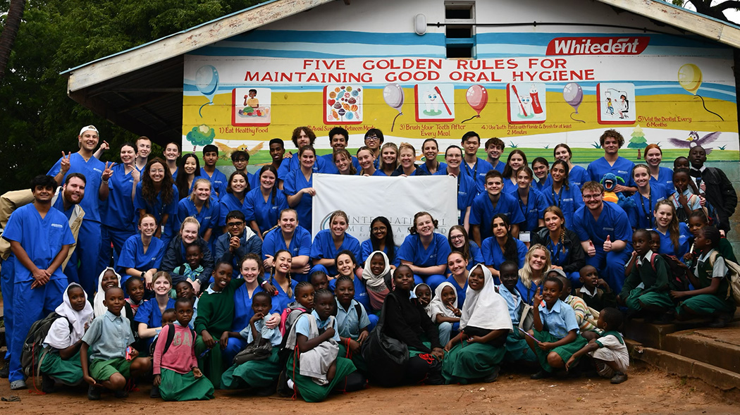 Thayer and the other IMA volunteers visited a primary school in Kenya to teach schoolchildren about hand and oral hygiene.