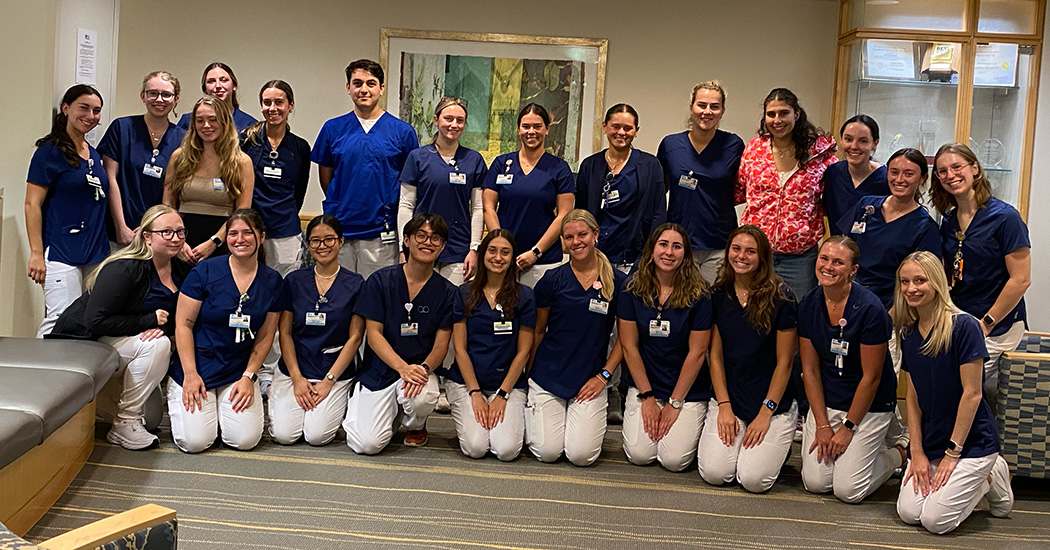 Casey Tully (back row, third from right) and the summer 2024 cohort of externs at The Valley Hospital.