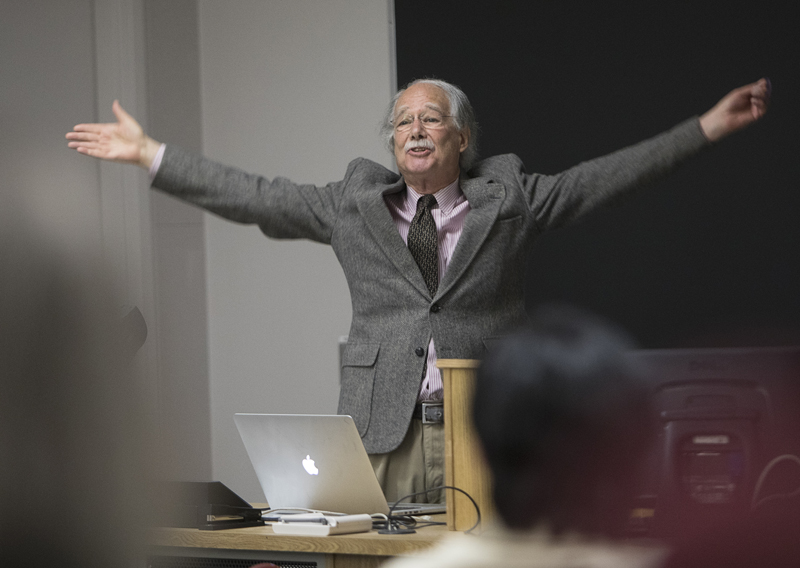 Edward Weisband is greeted by an audience of former and current colleagues and students at an Oct. 6 talk in Academic A.