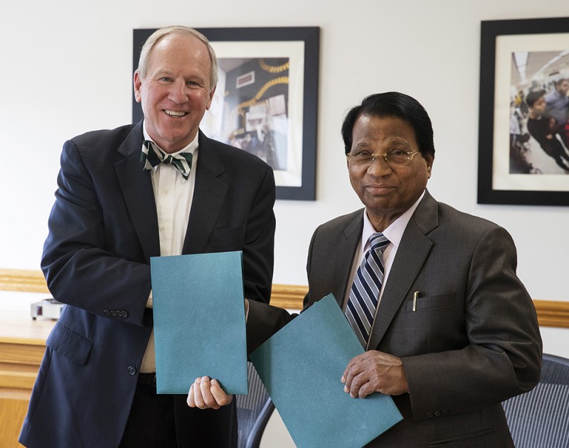 Binghamton University Executive Vice President for Academic Affairs and Provost Donald Nieman, left, and Vellore Institute of Technology Chancellor Govindasamy Viswanathan signed a deal that reaffirms a partnership between VIT and the Thomas J. Watson School of Engineering and Applied Science.