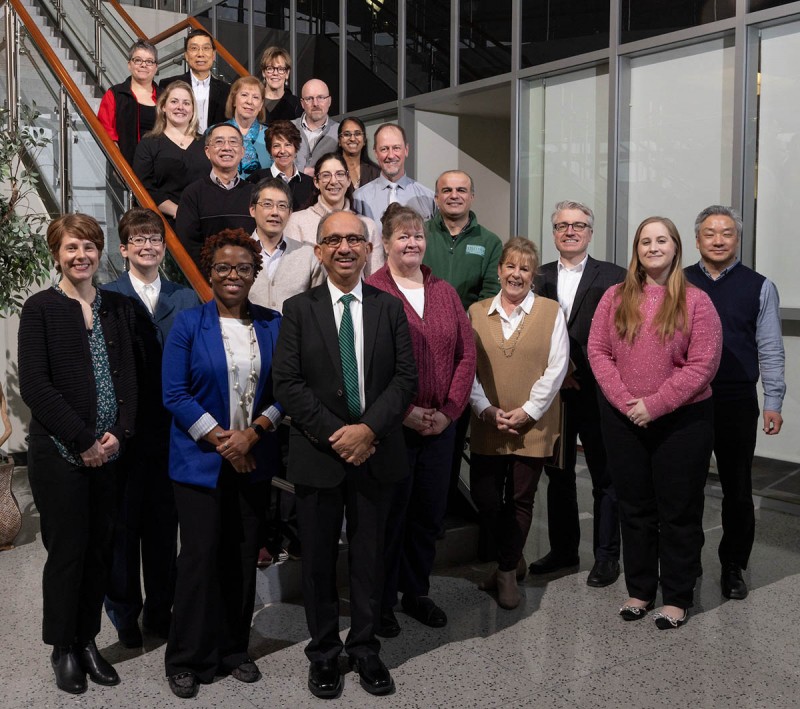 Watson College Dean Hari Srihari with the dean's office staff and Watson department heads.