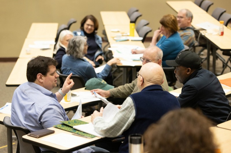 Community members participate in discussion during the second day of a spring 2024 Climate Summit.