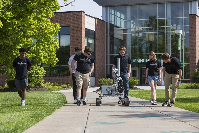 Members of the Binghamton University Rover Team tested this year's rover at the Peace Quad on May 20. From left to right are Zain McKay, Abdallah Halaweh, Brian Flynn, Jonathan Sarasohn, Rebecca Carpenter and Thomas Wiedmann.