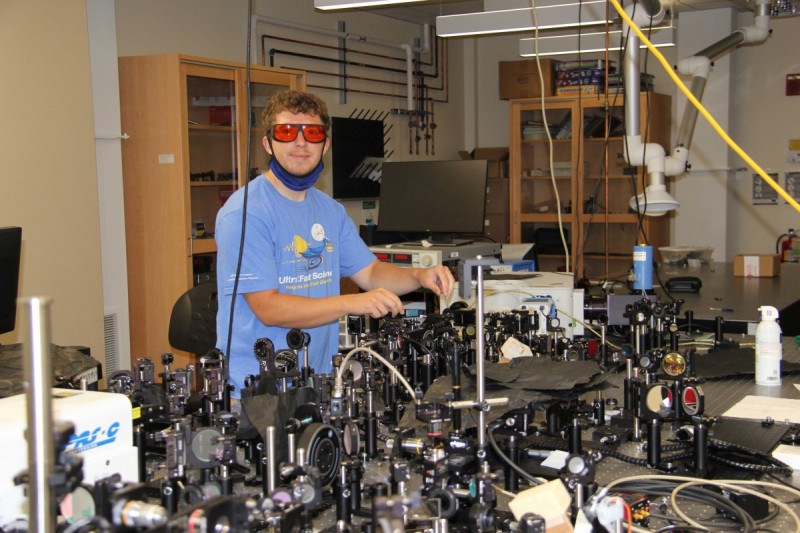 Doctoral student Dennis Dempsey in Associate Professor of Physics Bonggu Shim's plasma and laser physics research lab.