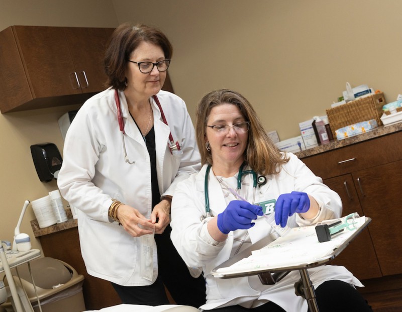 Associate Professor Nicole Rouhana (left) oversees Decker’s HRSA program and has authored or co-authored every grant request. Decker’s first HRSA grant was awarded in July 2016. Lisa Merritt, MS ’22, was part of the 2019-21 cohort.