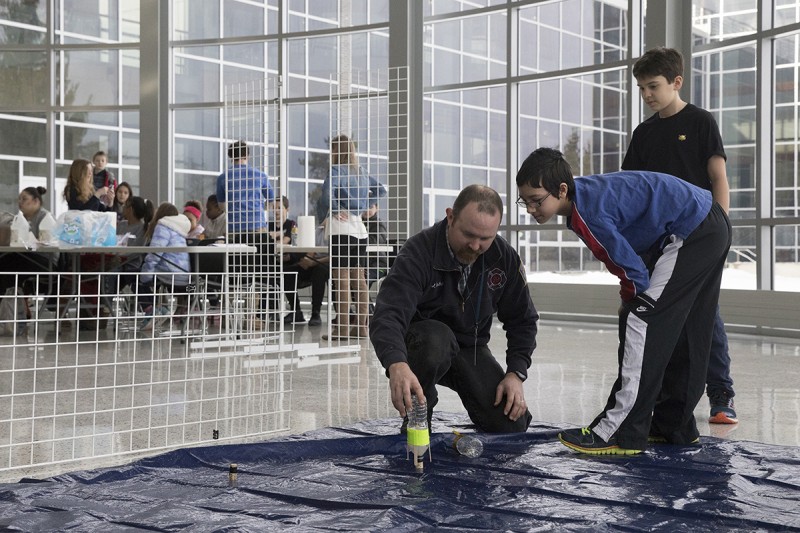 Binghamton East and West Middle-School students in the sixth grade learn basic science lessons from Watson School students during a STEM visit to the Engineering and Science Building at the Innovative Technologies Complex, Feb. 13, 2017.