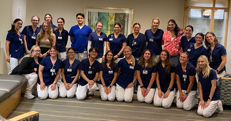 Casey Tully (back row, third from right) and the summer 2024 cohort of externs at The Valley Hospital.