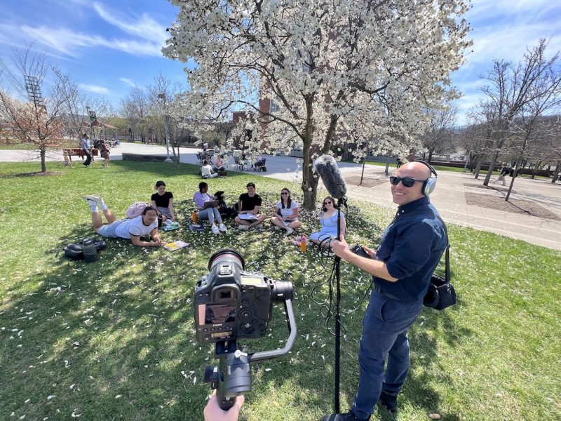 A behind-the-scenes look at John Brhel and Casey Staff, filming Van Caeseele and friends for a final shot of the campus tour video.