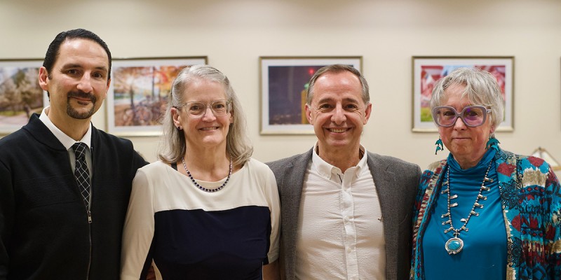 Decker College of Nursing and Health Sciences Dean Mario Ortiz (far left) with retiring faculty members (from left) Rosa Darling, A. Serdar Atav and Mary Muscari at a reception held April 18 in the Anderson Center President's Reception Room.