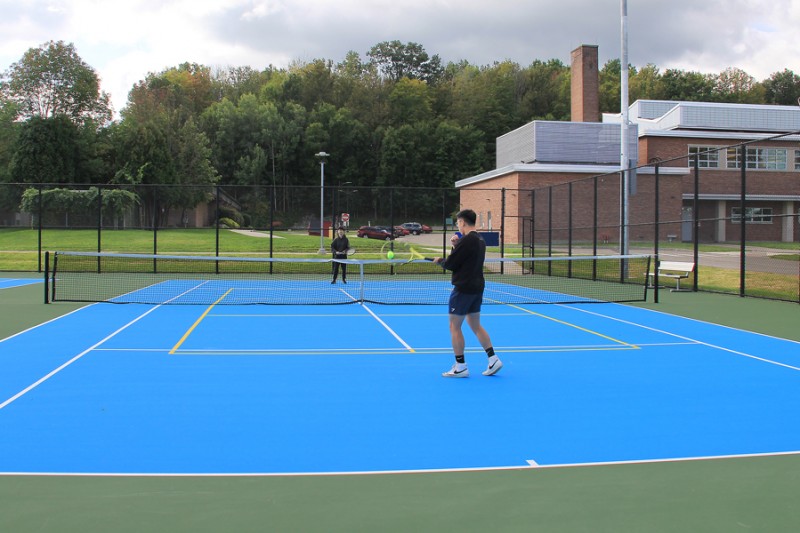 Students enjoy the newly resurfaced tennis courts at the East Gym, Recreation Center.