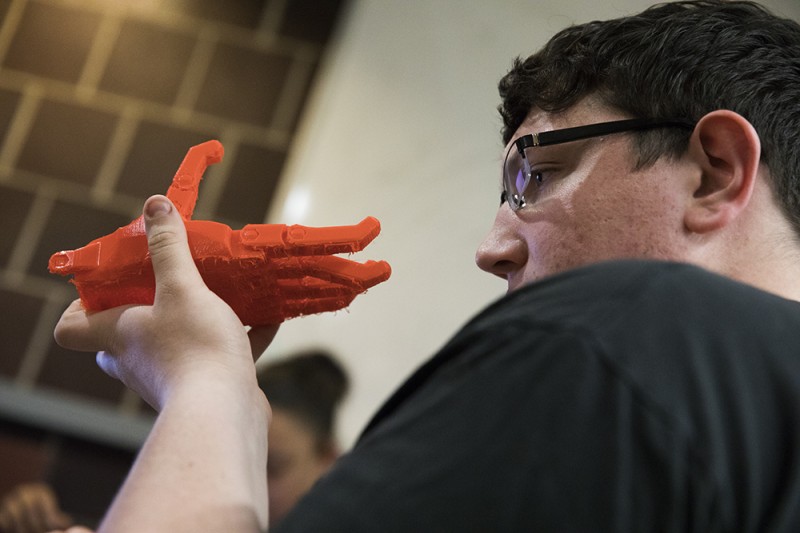 Engineering students develop 3-D-printed prosthetic hand for campus  employee