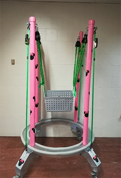 The modified jumperoo for a young girl with cerebral palsy.