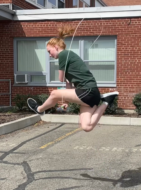 Sophomore Malia Everett executes a freestyle jump rope trick.