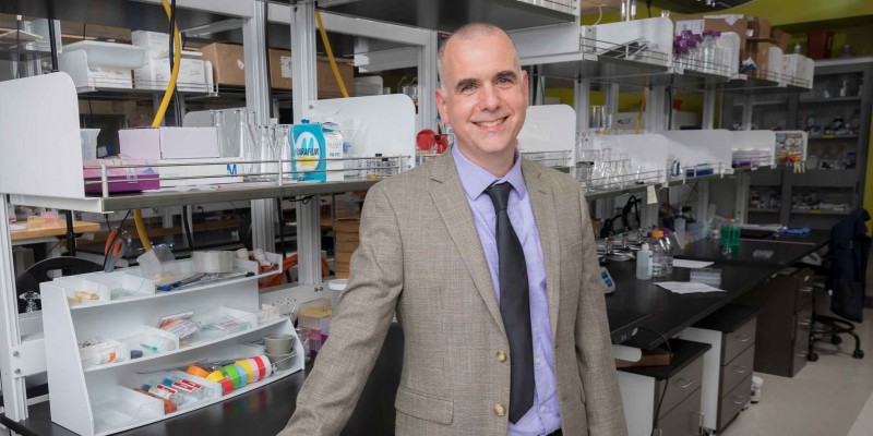 Associate Professor of Pharmaceutical Sciences Nathan Tumey in his lab at the Binghamton University School of Pharmacy and Pharmaceutical Sciences.