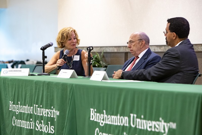 CCPA Dean Laura Bronstein moderates a panel discussion with Dr. Ira Harkavy, director of the Netter Center at UPenn, and SUNY Chancellor John King.