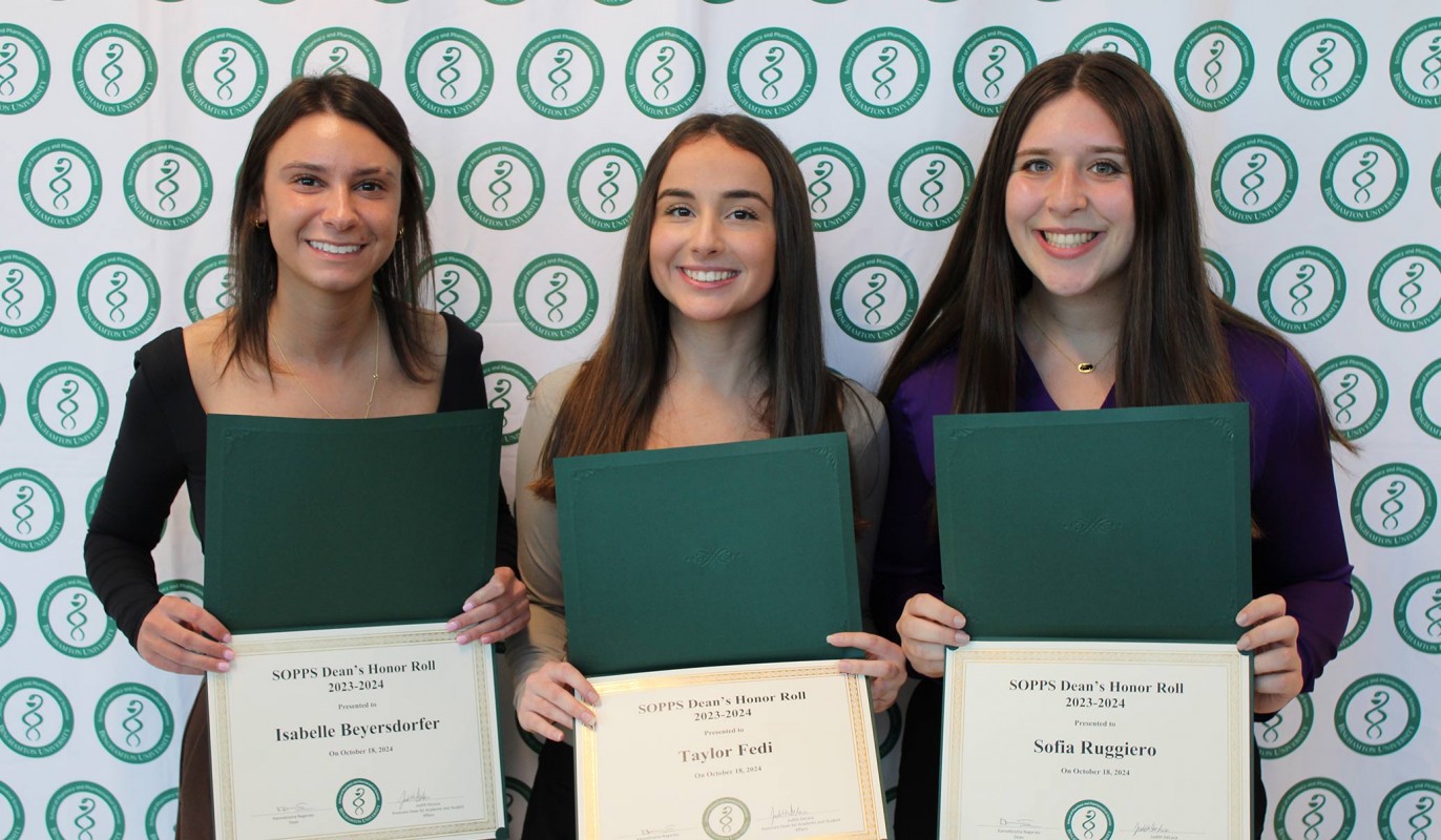 Second-year pharmacy students Isabelle Beyersdorfer (left), Taylor Fedi (middle) and Sofia Ruggiero (right) pose with their SOPPS Dean's Honor Roll certificates.