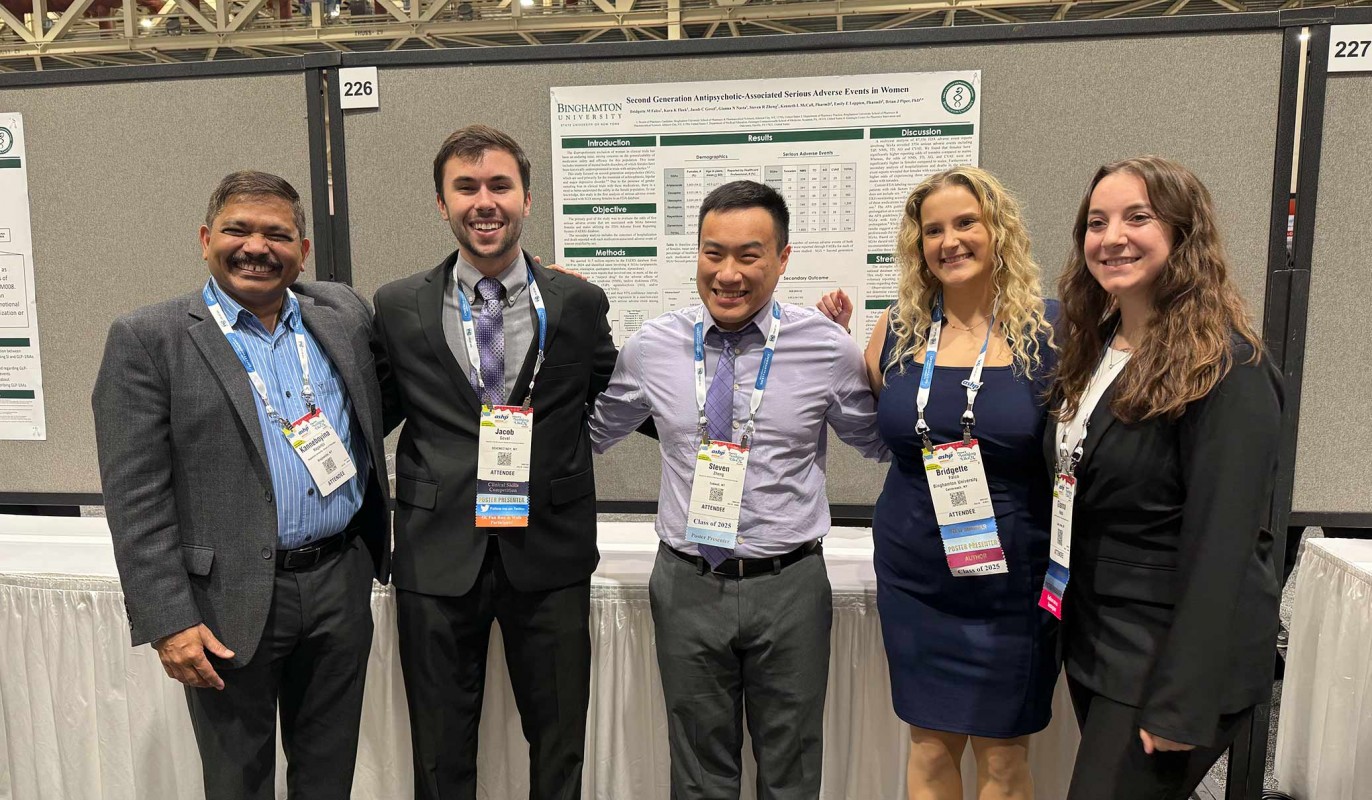 Binghamton School of Pharmacy Dean Kanneboyina Nagaraju standing with fourth-year PharmD students Jacob Govel, Steve Zheng, Bridgette Falco and Gianna Nasta Image Credit: Katie Sasina.