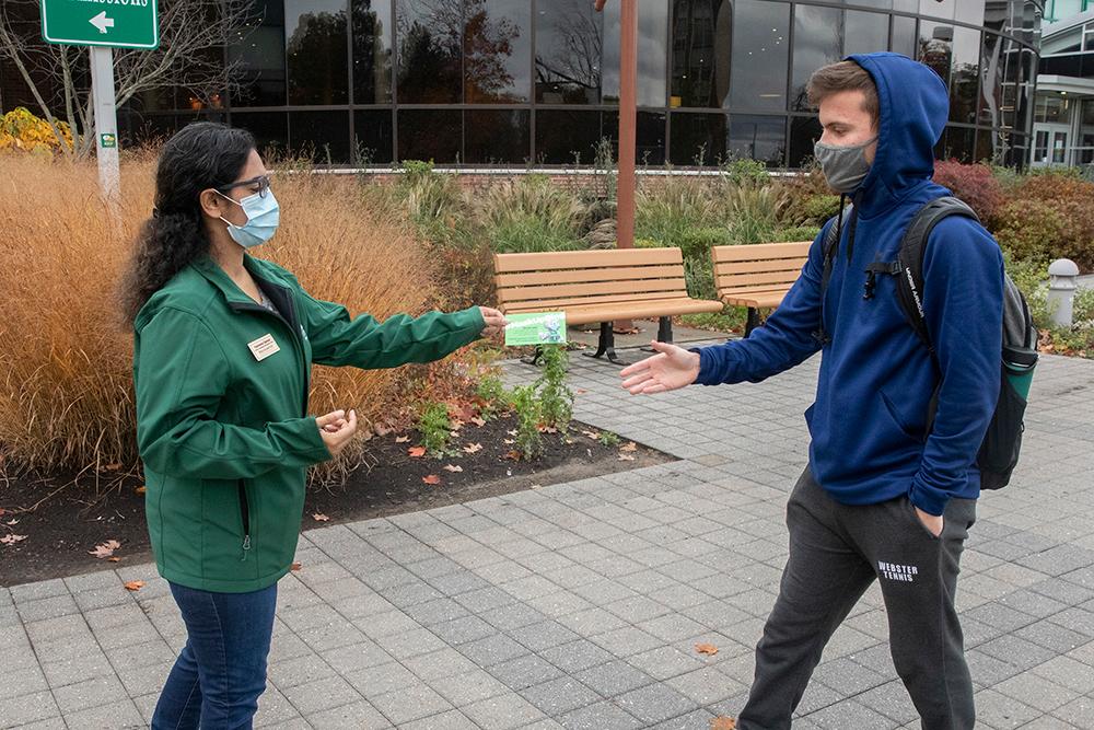 'Green Jackets' monitor campus public spaces for COVID compliance 