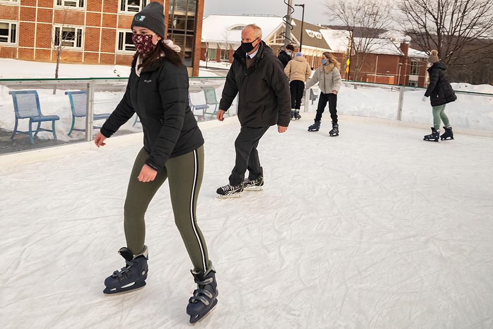 President Stenger skates at the ice rink 