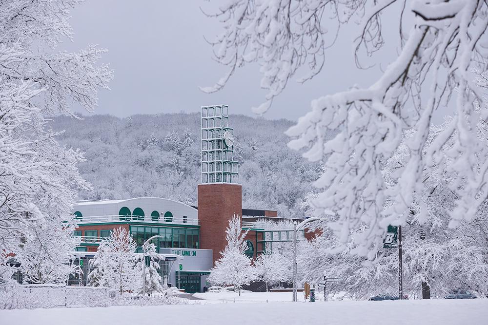 Clock tower covered in snow 